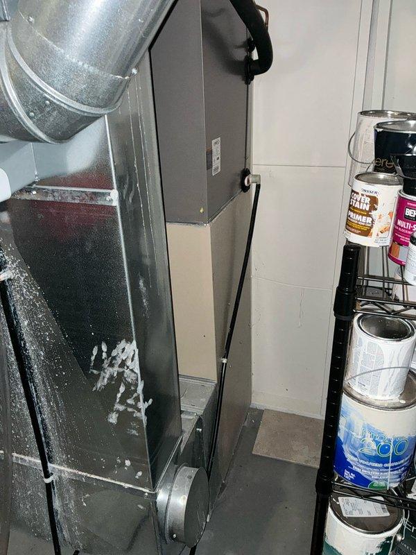 Completed installation of a new Concord furnace system in utility room, including proper connection of PVC exhaust/intake ventilation piping and electrical components. Existing air handler was inspected and found to have dust accumulation but no significant deterioration or damage that would impact system performance.