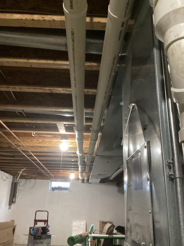 Performed comprehensive tune-up on residential HVAC system, including inspection of interior components (control board, wiring harnesses, gas valve, and motor assembly) and verification of proper PVC venting installation in basement mechanical area. All components showed normal operational wear with no significant issues detected; system is functioning within manufacturer specifications.