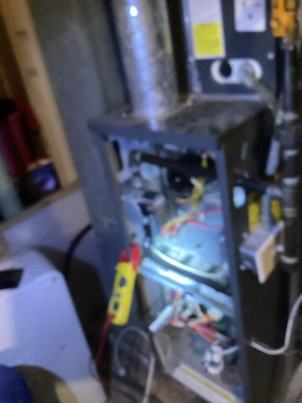 Performed diagnostic assessment on furnace with no heat complaint and identified significant corrosion on control board terminal connections. Opened access panel to examine internal components, used multimeter to verify electrical issues at connection points. Cleaned corroded terminals and restored proper electrical connectivity, returning the system to normal operation.
