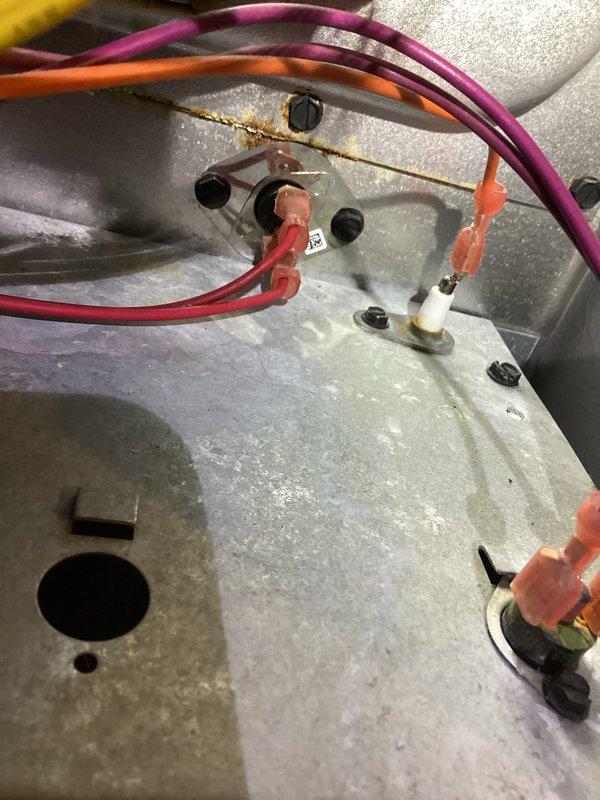 Performed diagnostic assessment on furnace with no heat complaint and identified significant corrosion on control board terminal connections. Opened access panel to examine internal components, used multimeter to verify electrical issues at connection points. Cleaned corroded terminals and restored proper electrical connectivity, returning the system to normal operation.