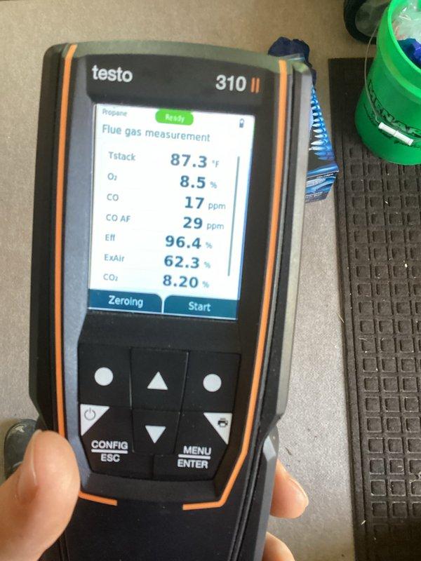 Responded to No Heat call for furnace less than 10 years old. Performed combustion analysis with Testo 310 II showing excellent efficiency at 96.4% with safe CO readings (17 ppm). Inspected burner assembly and verified proper flame pattern across all three burners, confirming system is operating correctly after service.