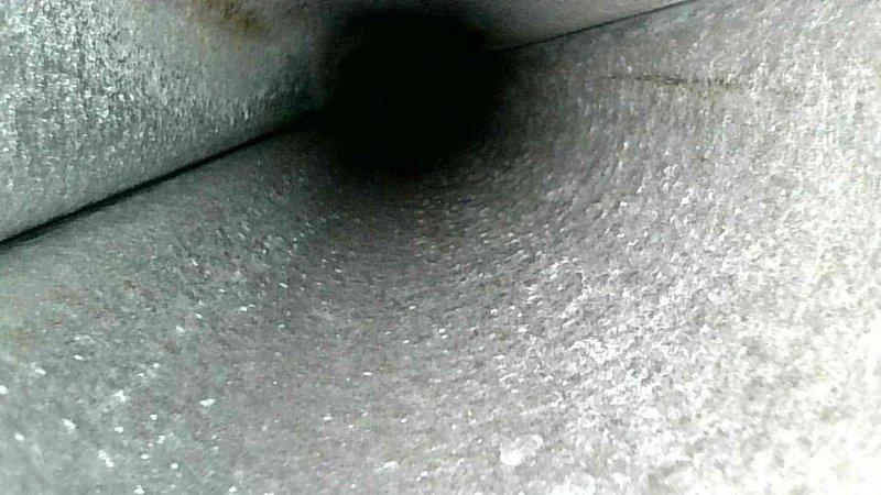 Conducted routine HVAC tune-up service, including thorough inspection of ductwork system. Identified moderate dust accumulation in ventilation ducts and performed visual assessment of interior duct surfaces, noting typical wear consistent with standard galvanized sheet metal components.