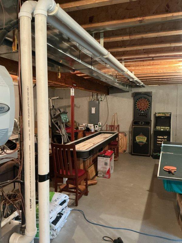 Performed comprehensive tune-up service on York furnace system located in basement mechanical room. Inspected all ductwork connections, PVC condensate drainage, and verified proper installation of equipment. System was found to be in normal operating condition with no visible issues requiring immediate attention.