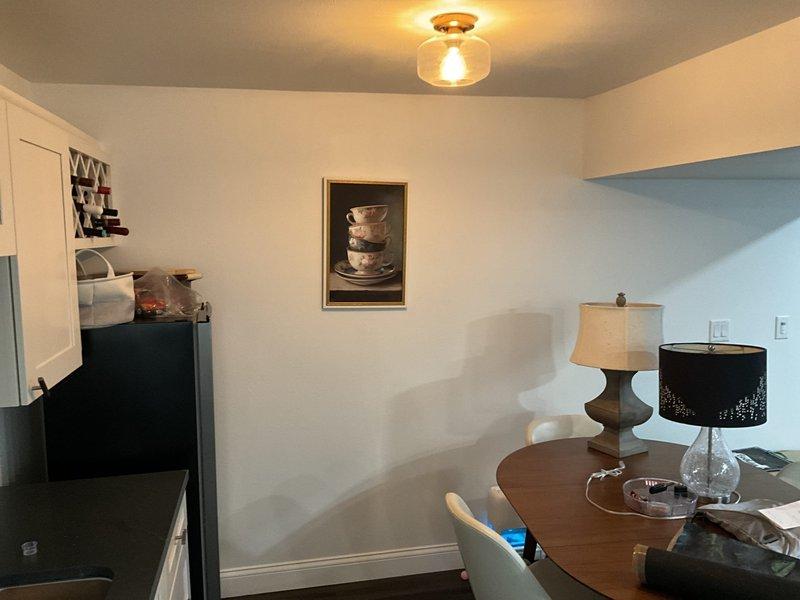 Conducted site assessment for mini-split installation in residential space, evaluating electrical requirements and optimal positioning options. Identified interior wall-mounted unit location in dining area with clear path for refrigerant lines, and determined suitable exterior condenser placement to minimize noise while maintaining proper clearance for airflow.