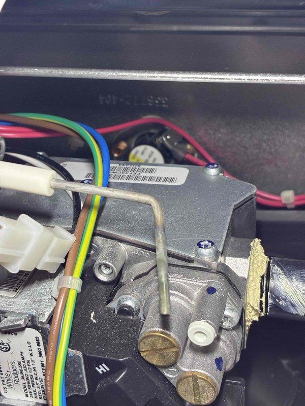 Performed routine maintenance inspection on HVAC system. Examined internal valve assembly and control board, confirming proper wire connections and component integrity. All electrical connections were secure with no signs of wear or damage to the control mechanism.