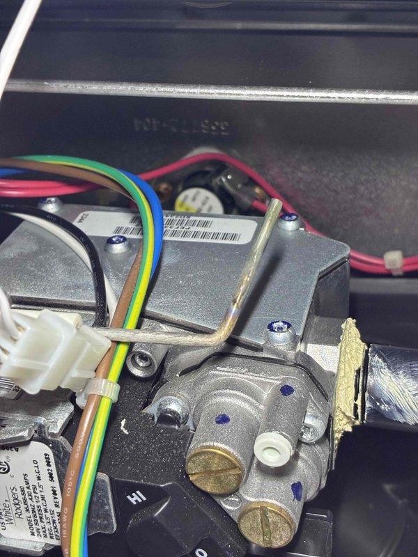 Performed routine maintenance inspection on HVAC system. Examined internal valve assembly and control board, confirming proper wire connections and component integrity. All electrical connections were secure with no signs of wear or damage to the control mechanism.
