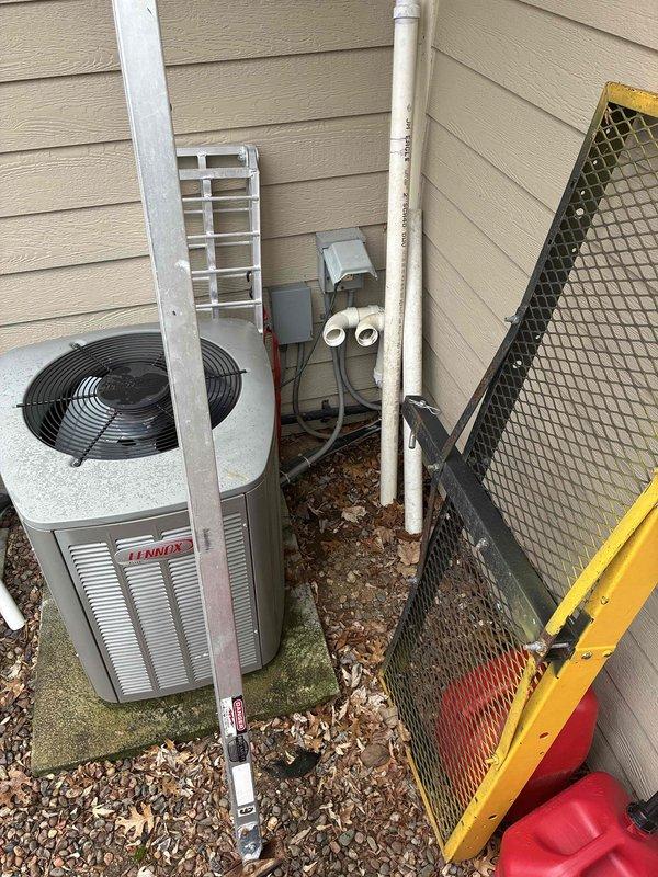 Conducted full assessment of existing HVAC system, including interior furnace unit with attached humidifier and exterior Lennox condensing unit. Prepared comprehensive replacement estimate for complete system upgrade, noting the current installation's age and configuration within the basement mechanical area and outdoor protective enclosure.