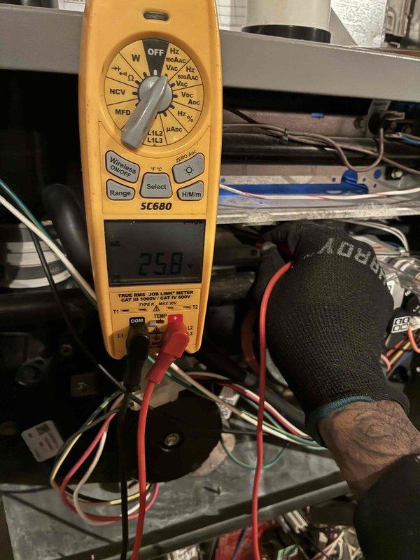 Completed electrical diagnostics on HVAC system using Fieldpiece SC680 multimeter, measuring voltage readings of 258V and verifying proper electrical connections. Performed comprehensive testing of control circuitry with specialized probes to ensure proper system operation prior to finalizing ductwork installation.