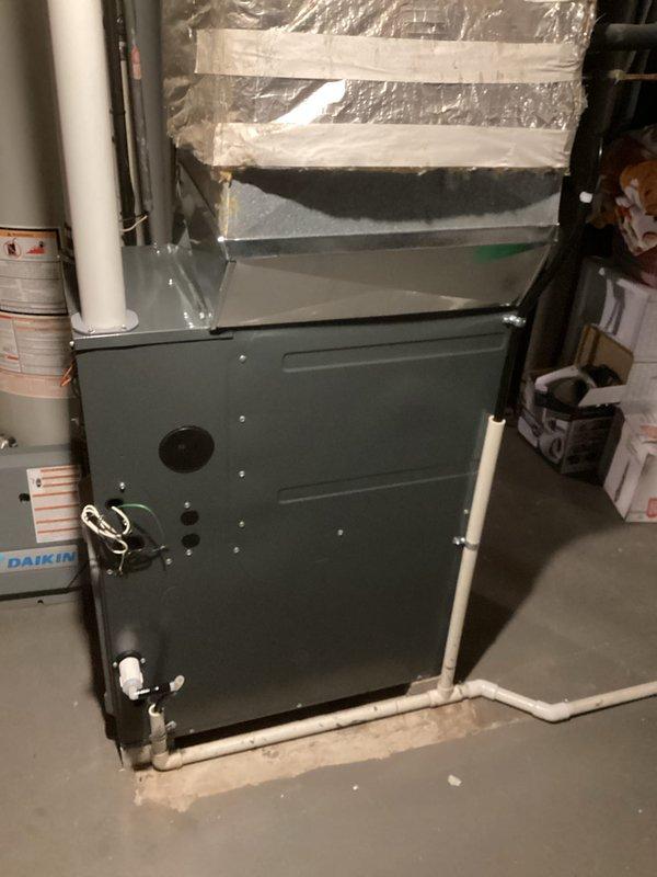 Successfully installed a new Daikin furnace in the utility room, including proper connection of PVC condensate drain lines and integration with existing ductwork using foil insulation. System was pressure tested with digital manometer and verified to be operating at optimal specifications with zero leakage.