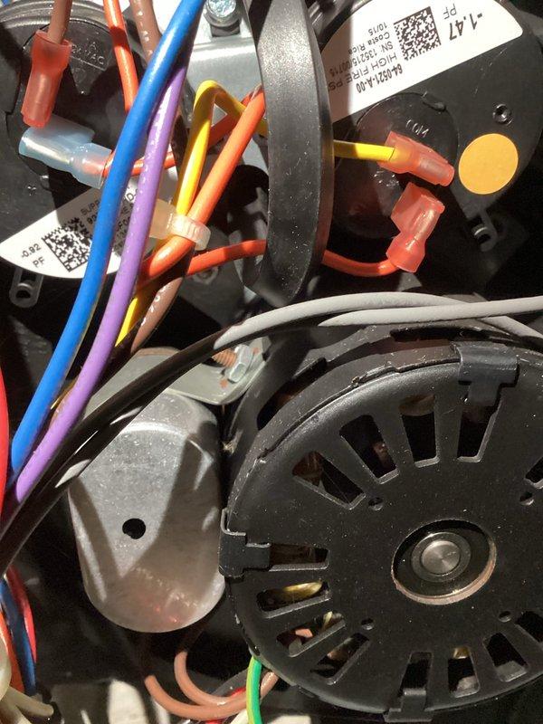 Performed comprehensive inspection of furnace components including fan motor assembly and pressure switch. Verified proper wire connections throughout control system with focus on intact wire caps and secure terminations. Confirmed pressure switch functionality with all indicators operating as specified.