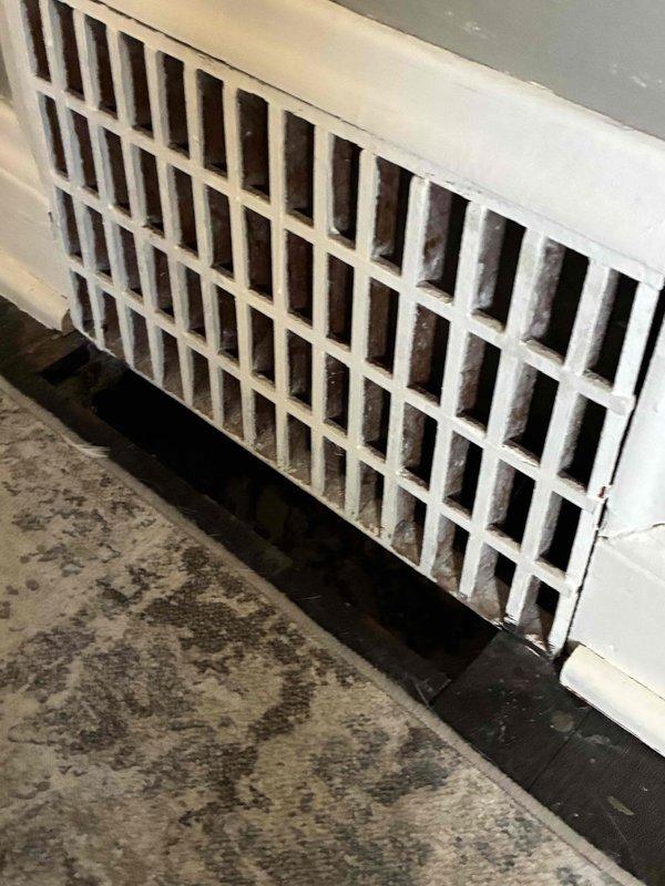 Performed comprehensive maintenance on Goodman furnace system. Identified severely clogged return air register with significant dust accumulation restricting airflow. Cleaned ventilation components and verified proper system operation to restore optimal heating performance.