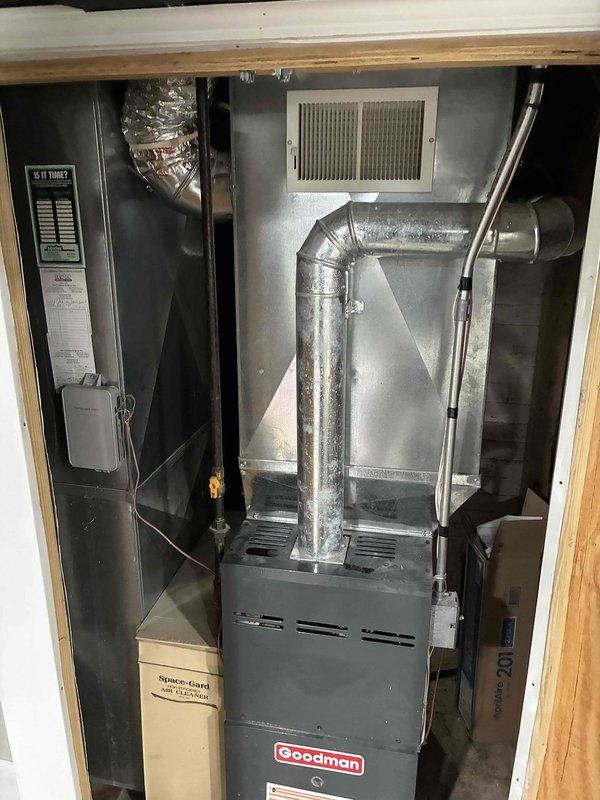 Performed comprehensive maintenance on Goodman furnace system. Identified severely clogged return air register with significant dust accumulation restricting airflow. Cleaned ventilation components and verified proper system operation to restore optimal heating performance.