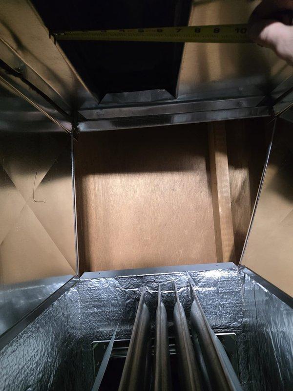 Successfully installed a new high-efficiency furnace with proper ductwork connections and PVC venting. Conducted measurements of the existing ductwork system to ensure optimal airflow configuration. Unit was mounted on a raised platform with all control wiring and mechanical components properly secured and tested for operation.