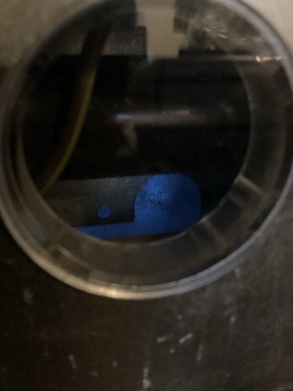 Diagnosed no-heat condition on furnace less than 10 years old by inspecting flame sensor through sight glass and examining internal components including circuit board and blower assembly. Cleaned flame sensor to restore proper flame detection, verified ignition sequence, and confirmed system operation before completing service.