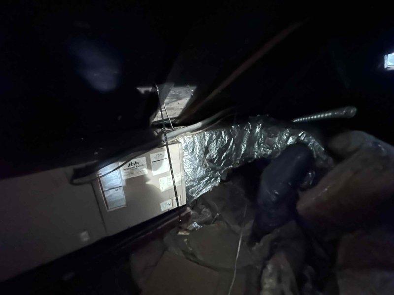 Conducted inspection of existing HVAC system located in confined attic space, documented current equipment specifications from manufacturer plate, and measured ductwork configuration. Created detailed sketch of the air distribution system with measurements for 12" flex return and various supply runs (21", 19", 44", and 16") to prepare comprehensive replacement estimate.