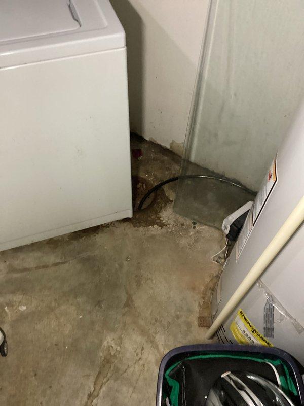 Completed installation of a complete HVAC system in utility area, replacing outdated equipment with new unit featuring advanced filtration components. System was properly positioned on concrete floor with all necessary electrical connections secured and tested for optimal performance.