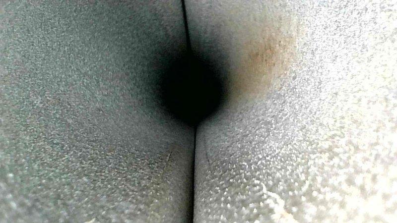 Conducted routine maintenance inspection of HVAC system. Examined interior ductwork, noting minor dust accumulation and slight oxidation around junction points. Inspected attic area to verify proper installation of nearby plumbing components and confirmed adequate clearance between PVC piping and HVAC ductwork to prevent interference with system operation.