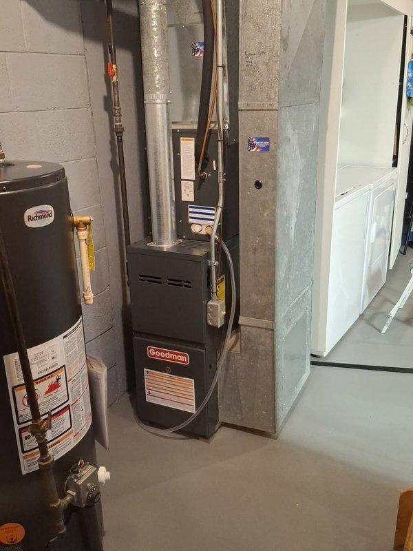 Responded to a no-heat call for a relatively new Goodman furnace installed in basement utility room. Upon inspection, found issues with the blower motor assembly and associated wiring connections. Repaired faulty wiring at the motor terminal, restored proper electrical connections, and verified system operation through complete heating cycle testing.