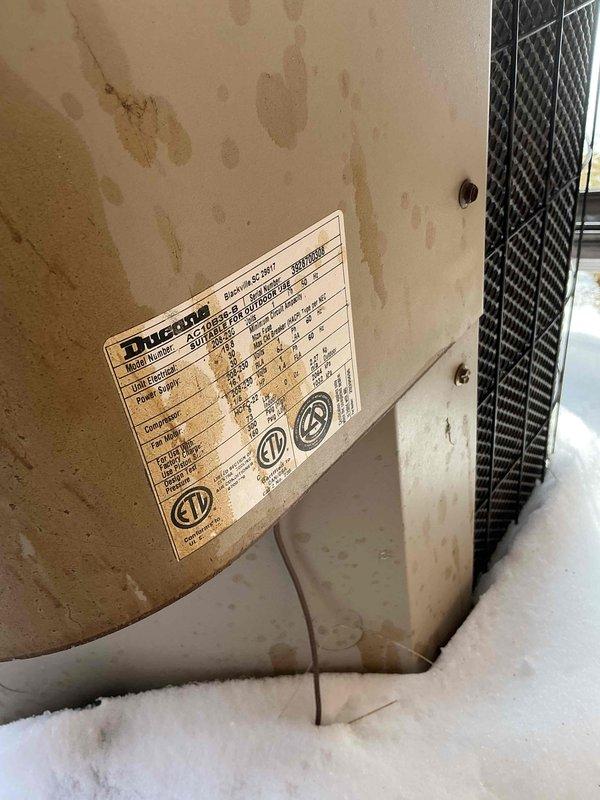 Conducted comprehensive assessment of aging Ducane HVAC system installed in residential attic space. Unit shows significant weathering with visible water damage and deterioration. Recommended full system replacement due to age-related wear, potential efficiency issues, and to ensure compliance with current specifications as indicated on manufacturer labels.