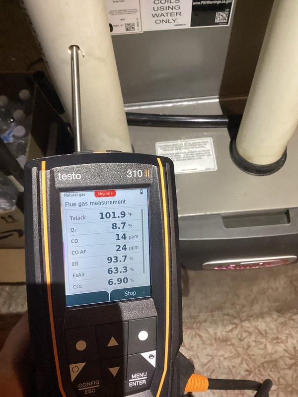 Performed routine maintenance on heating system. Verified equipment level for proper installation and operation. Conducted combustion analysis using Testo 310 II gas analyzer, which confirmed unit is operating at 93.7% efficiency with CO levels within safe parameters (14 ppm).