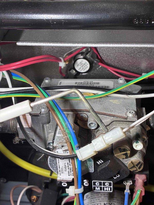 Performed diagnostic inspection of furnace control board and wiring components. Examined electrical connections and terminal points, ensuring proper wire routing and secure connections. Verified operation of fan motor assembly and inspected high/low control settings for optimal functionality.