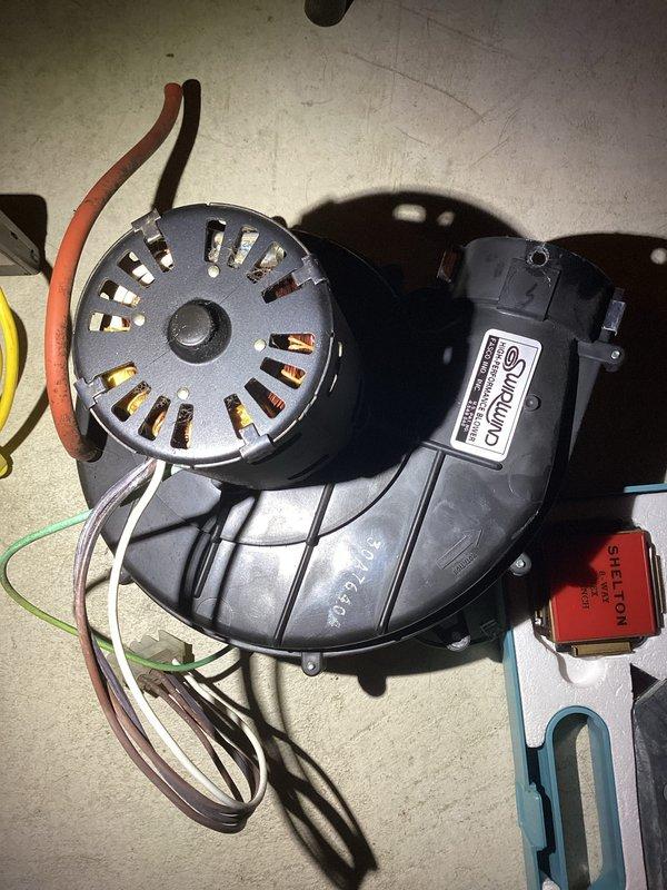 Responded to no-heat call for Rheem Classic 90 Plus furnace. Diagnosed failed blower motor, removed defective unit, and installed new replacement motor with proper wiring connections. System restored to normal operation with verified heating function.