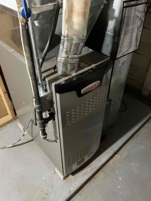 Performed routine maintenance on Lennox HVAC system. Inspected furnace components, ductwork connections, and ventilation system - all found in normal working condition. Examined adjacent plumbing infrastructure including PVC drainage pipes and copper piping with brass fittings; no issues detected.