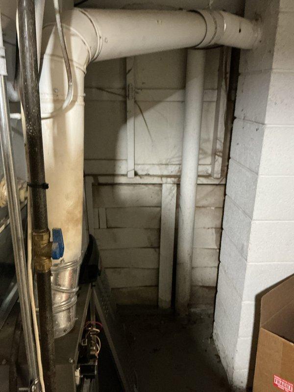 Performed routine maintenance on Lennox HVAC system. Inspected furnace components, ductwork connections, and ventilation system - all found in normal working condition. Examined adjacent plumbing infrastructure including PVC drainage pipes and copper piping with brass fittings; no issues detected.