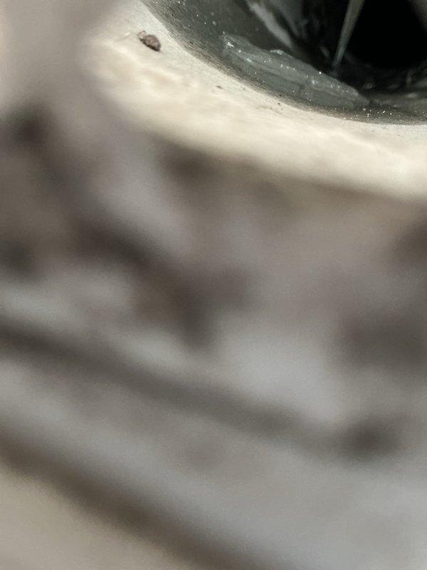 Completed installation of exterior ventilation duct with proper sealing and mounting to vinyl siding. Verified airflow functionality and inspected connection points to ensure secure attachment and weather-resistant seal around perimeter.