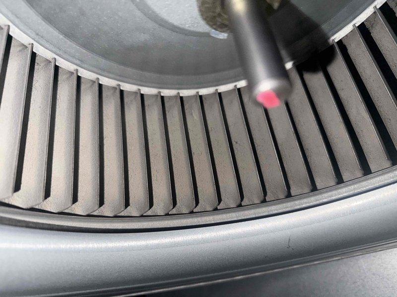 Performed combustion analysis on the heating system using Fyrite INTECH analyzer, confirming optimal operation with readings of O₂ 8.6%, CO 21ppm, efficiency 91.4%, and CO₂ 8.1%. Inspected blower assembly for cleanliness and proper operation; all components found in good working condition with no issues detected.