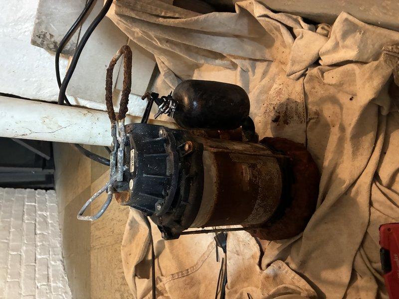 Removed and replaced severely corroded sump pump from confined pit area. Original unit showed extensive rust damage and electrical deterioration requiring complete replacement. Installed new pump system and verified proper operation before completing service.