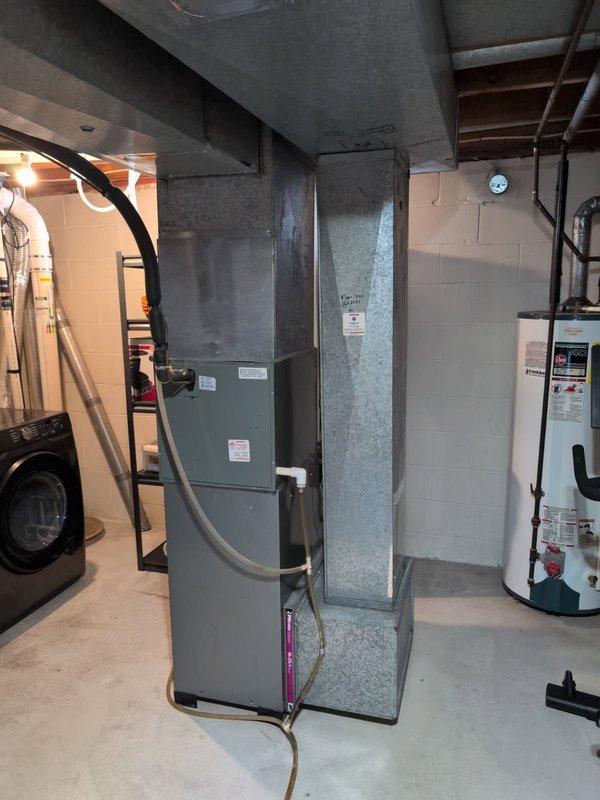 Responded to no-heat call for residential system less than 10 years old. Diagnosed failed ignition sequence on furnace located in basement utility room adjacent to water heater and laundry area. Replaced faulty flame sensor and cleaned burner assembly, restoring proper ignition and heat function. System tested with multiple cycles and confirmed normal operation before departure.