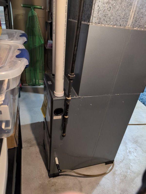 Responded to no-heat call for residential system less than 10 years old. Diagnosed failed ignition sequence on furnace located in basement utility room adjacent to water heater and laundry area. Replaced faulty flame sensor and cleaned burner assembly, restoring proper ignition and heat function. System tested with multiple cycles and confirmed normal operation before departure.