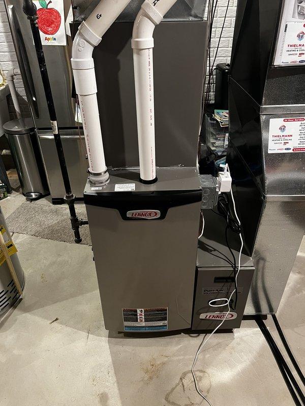 Performed comprehensive tune-up service on a Lennox furnace system, including inspection of heat exchanger, PVC exhaust/intake piping, and operational components. Checked for proper combustion and venting while ensuring all safety controls were functioning correctly. System now operating at optimal efficiency with no issues detected.