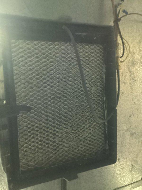 Inspected HVAC system and found severely clogged air filter with significant dust and debris accumulation. Removed and replaced the filter to restore proper airflow and system efficiency, which should improve indoor air quality and prevent potential system strain.