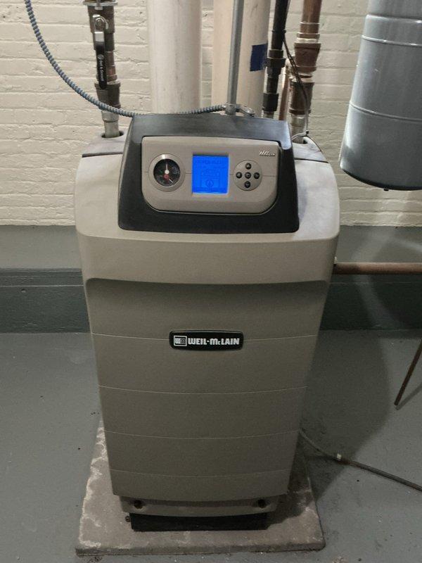 Responded to no-heat call for aging Weil-McLain boiler system. Diagnostic testing revealed faulty temperature sensor and outdated control module causing improper modulation. Replaced defective components, recalibrated system parameters, and verified proper operation with supply temperature reaching 139°F with appropriate modulation in response to demand.