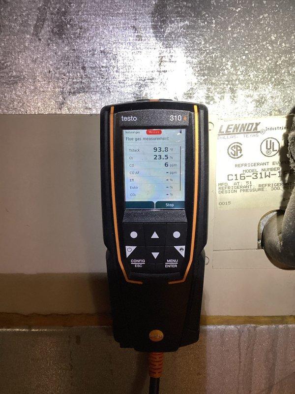 Performed diagnostic assessment on aging Lennox furnace (model C16-31H-1) that was not producing heat. Conducted combustion analysis with Testo 310 analyzer, revealing high oxygen levels (23.5%) and minimal carbon monoxide (6 ppm) indicating poor combustion efficiency. Cleaned flame sensor and burner assembly, adjusted gas pressure to manufacturer specifications, and restored proper operation with improved combustion readings.