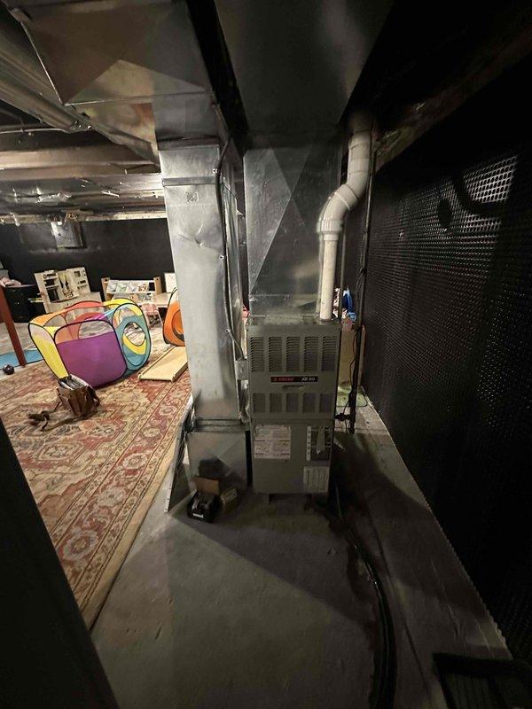 Conducted a comprehensive evaluation of existing HVAC system including furnace unit and associated ductwork in basement utility area. Documented current installation conditions showing galvanized sheet metal ductwork configuration, PVC venting, and connection points. Prepared replacement estimate for complete system upgrade based on observed equipment age and installation parameters.