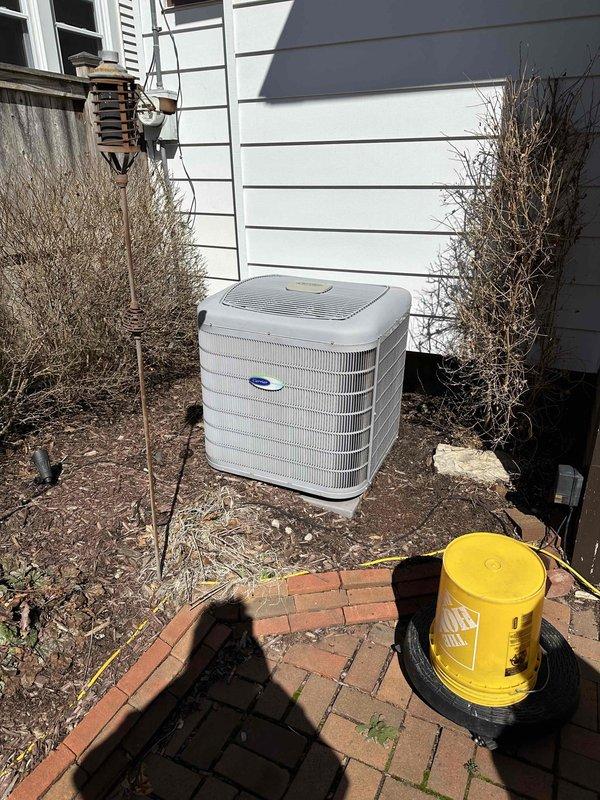 # HVAC System Replacement Estimate

Conducted comprehensive site evaluation for complete HVAC system replacement at residential property. Assessed existing outdoor condenser unit positioned on concrete pad against vinyl siding, noting equipment age and operational status. Evaluated electrical infrastructure including main breaker panel with existing circuit configuration to determine electrical service adequacy and required modifications for new equipment installation. Documented current system specifications, mounting location accessibility, and clearance requirements for replacement unit sizing and placement recommendations.