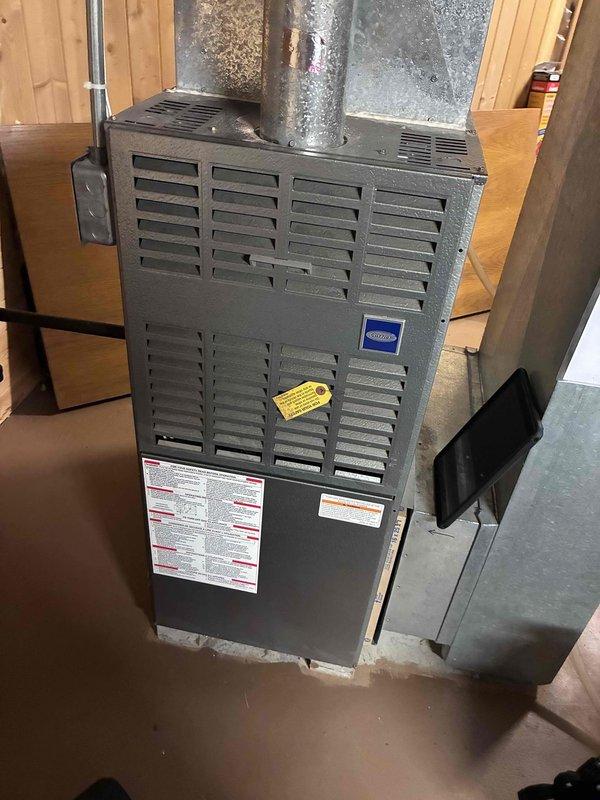 # Service Report: HVAC No Heat Call

Responded to no heat call on residential furnace system over 10 years old. Upon arrival, performed complete system diagnostic including visual inspection of furnace cabinet, control board, ignition system, and gas valve operation. Checked thermostat communication and verified proper 24V control voltage at unit. Inspected heat exchanger through accessible panels and confirmed structural integrity with no visible cracks or deterioration.

Tested blower motor operation and amp draw, verifying performance within manufacturer specifications. Examined flame sensor for carbon buildup and contamination that could prevent proper flame rectification. Cleaned flame sensor rod using emery cloth to remove oxidation and restore proper microamp signal. Verified proper gas pressure at manifold using manometer and confirmed inlet pressure met utility specifications.

Cycled system through multiple heating cycles to verify ignition sequence, flame establishment, and 