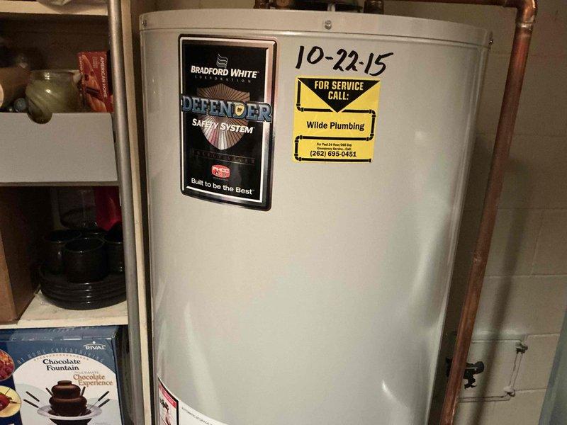 # HVAC Estimate - Replacement Summary

Conducted comprehensive assessment of existing Bradford White Defender Safety System water heater installation for replacement estimate. Unit currently installed in basement utility room with copper supply and discharge piping, pressure relief valve assembly, and associated connections. Evaluated existing plumbing configuration including hot and cold water lines, shut-off valves, and venting system. Documented current installation specifications, pipe routing, clearances, and accessibility for replacement planning. Assessed utility room conditions, available workspace, and structural considerations necessary for efficient equipment removal and new unit installation.