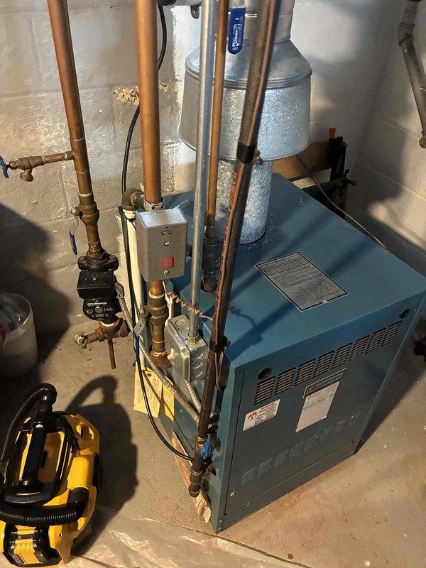 Completed comprehensive tune-up and inspection of residential HVAC system including blue heating unit and associated mechanical components. Performed standard maintenance procedures, inspected copper piping connections, valves, and fittings throughout the system, and verified proper operation of all equipment to ensure optimal performance for the upcoming season.
