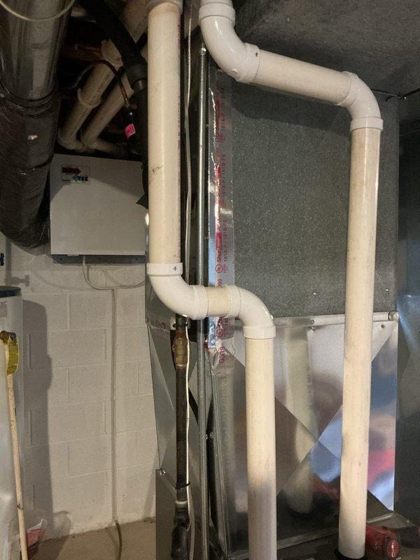 Completed comprehensive HVAC tune-up service on Lennox furnace system in basement mechanical room. Performed standard maintenance inspection of heating equipment, verified proper operation of all components including ductwork connections, PVC condensate drainage system, and heat exchanger assembly. All systems tested and found operating within normal parameters.