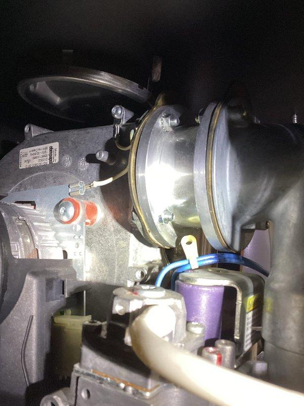 # HVAC Service Call - No Heat Condition

Responded to a no heat service call on a residential HVAC system less than 10 years old. Upon inspection of the furnace compartment, identified the induced draft blower motor assembly and associated components. Performed diagnostic testing on the ignition system, verified proper voltage supply to critical components including the control board and safety circuits. Examined the heat exchanger assembly, burner compartment, and all electrical connections for signs of failure or deterioration.

Inspected the inducer motor and pressure switch assembly, checking for proper operation and adequate draft pressure. Verified the integrity of all wiring harnesses, including power leads and control voltage circuits. Tested the hot surface ignitor and flame sensor for proper resistance values and functionality. Examined the gas valve and manifold assembly to ensure proper gas flow and pressure readings.

Checked the blower motor capacitor and all related star