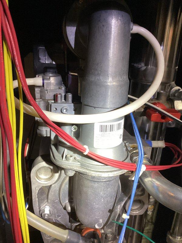 # HVAC Service Call - No Heat Condition

Responded to a no heat service call on a residential HVAC system less than 10 years old. Upon inspection of the furnace compartment, identified the induced draft blower motor assembly and associated components. Performed diagnostic testing on the ignition system, verified proper voltage supply to critical components including the control board and safety circuits. Examined the heat exchanger assembly, burner compartment, and all electrical connections for signs of failure or deterioration.

Inspected the inducer motor and pressure switch assembly, checking for proper operation and adequate draft pressure. Verified the integrity of all wiring harnesses, including power leads and control voltage circuits. Tested the hot surface ignitor and flame sensor for proper resistance values and functionality. Examined the gas valve and manifold assembly to ensure proper gas flow and pressure readings.

Checked the blower motor capacitor and all related star