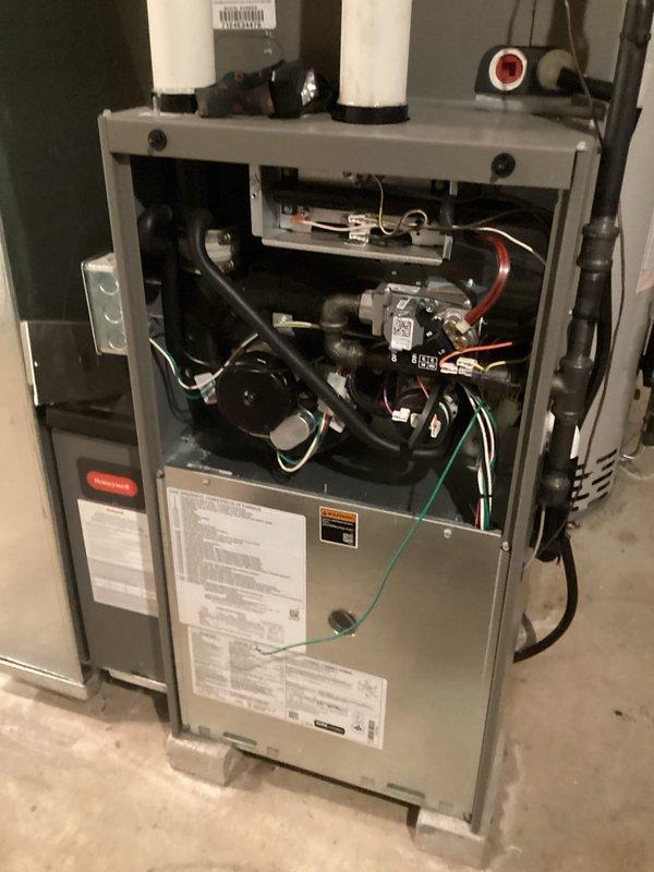 Completed prepaid maintenance inspection on residential gas furnace system. Performed comprehensive safety and efficiency testing using combustion analyzer, which confirmed proper operation with flue gas temperature of 90.4°F, oxygen level of 8.8%, carbon monoxide reading of 9 ppm, and system efficiency of 95.3%. Visually inspected internal components including gas valve assembly, ignition system, wiring connections, and venting system, with all components found to be in good working condition.