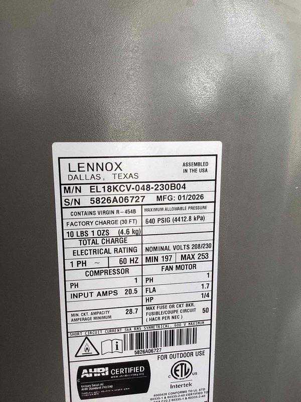 Completed installation of Lennox EL18KCV-048-230B04 outdoor condensing unit with matching evaporator coil system. Unit was positioned on gravel pad against exterior wall with proper clearances maintained, electrical connections completed per manufacturer specifications at 208/230V single-phase service, refrigerant lines installed and system charged with 10 lbs 1 oz of R-454B refrigerant per factory specifications. Condensate drain line installed with PVC piping, all electrical requirements met including 50-amp maximum overcurrent protection and minimum circuit ampacity of 28.7 amps. System startup performed, operational parameters verified, and unit tested for proper cooling operation.