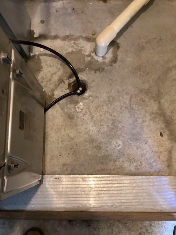 Completed full HVAC system installation in residential mechanical space, including new air handler unit with condensate drain pan, PVC drain lines, refrigerant line sets with insulation, and electrical connections. Installed safety controls including float switch assembly and mounted electrical disconnect box with proper labeling per code requirements. All components tested and verified operational upon completion.