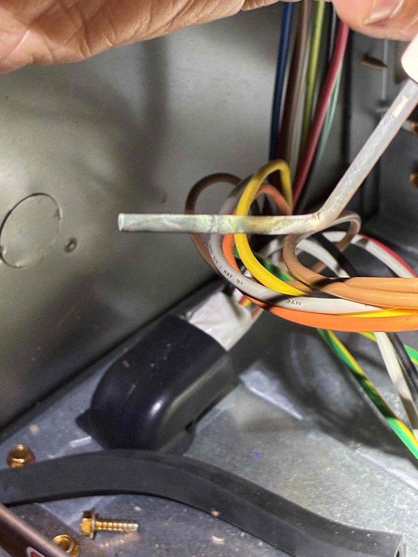 Completed comprehensive HVAC tune-up service including inspection of electrical components, wiring connections, and capacitor within the system's control panel. All wire bundles were examined for proper routing and secure connections, and the evaporator coil was inspected for cleanliness and proper operation. System tested successfully with all components functioning within normal parameters.