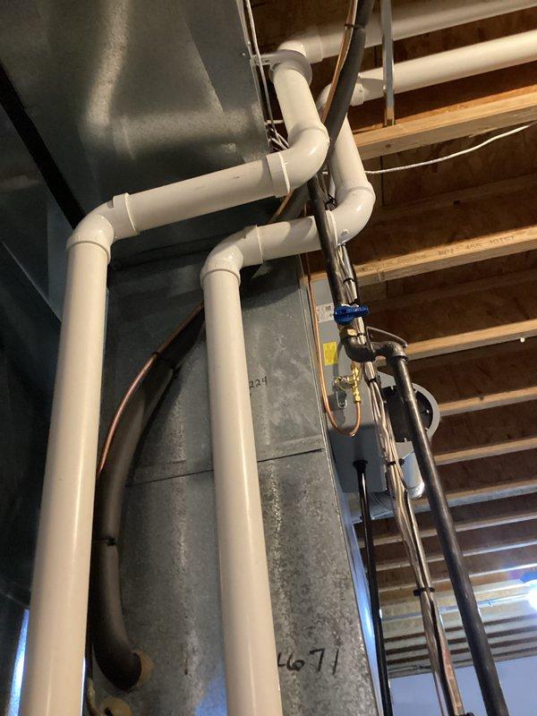 Completed comprehensive tune-up maintenance on residential gas furnace system. Performed full system inspection including gas valve operation, control board functionality, electrical connections, and venting components. Verified proper operation of all safety controls, confirmed adequate combustion air supply through PVC intake piping, and ensured exhaust venting meets code requirements.